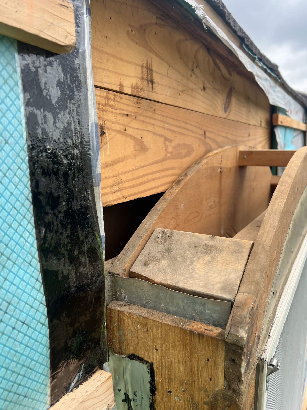 Rotted decking and framing opened up and being replaced with new boards
